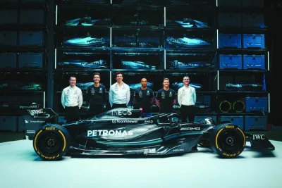 Lewis Hamilton (third right)  is seen with his Mercedes boss Toto Wolff (third left) in this team photo released before the start of the 2023 Formula One season.