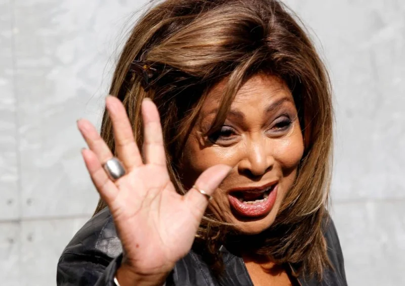 Tina Turner waves during a photo call before the Emporio Armani Autumn/Winter 2011 women&#039;s collection show at Milan Fashion Week, Italy February 26, 2011.  REUTERS/Stefano Rellandini/File Photo