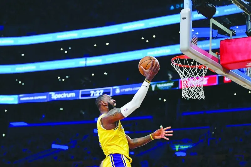
Los Angeles Lakers forward LeBron James shoots the ball against the Denver Nuggets during the third quarter in game four of the Western Conference Finals for the 2023 NBA play-offs at Crypto.com Arena. (USA TODAY Sports) 