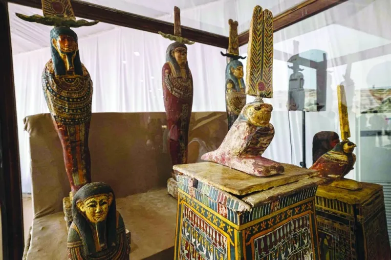 Objects are displayed at the Saqqara necropolis where archaeologists unearthed two human and animal embalming workshops as well as two tombs, south of Cairo, on Saturday.