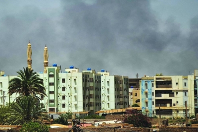 Smoke billows in Sudan’s capital Khartoum, on Saturday.