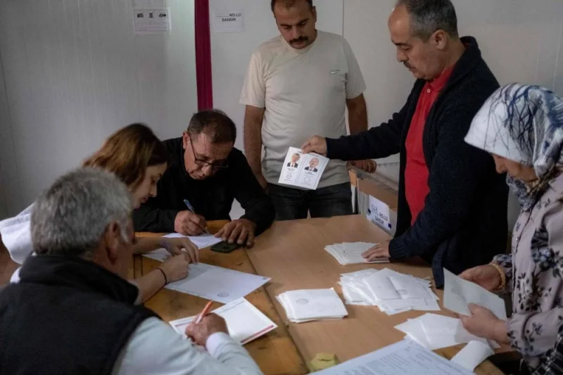 Electoral officials count the ballots on the day of the second round of the presidential election in the earthquake-hit city of Kahramanmaras. AFP