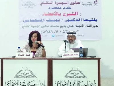 Dr Yousef al-Maslamani with Hanan Badi, the moderator.