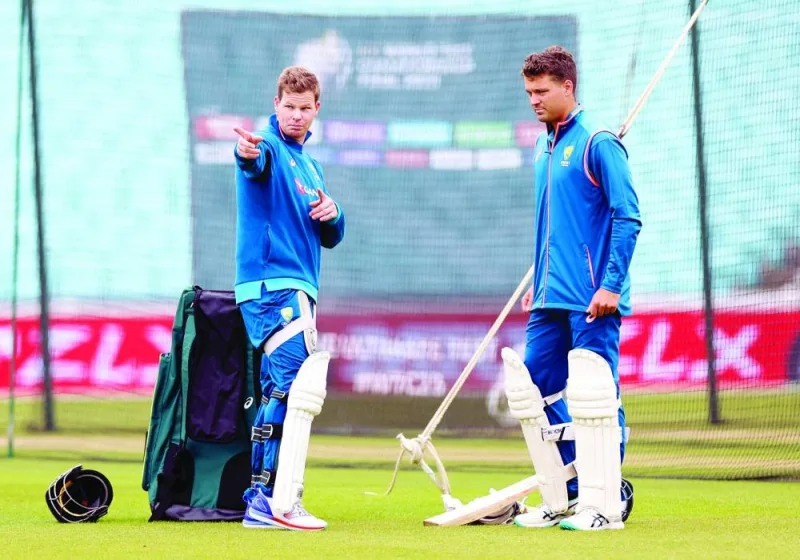 Australia’s Steve Smith (left) and Alex Carey during practice session on Tuesday, on the eve of ICC World Test Championship final against India at The Oval in London. (Reuters)
