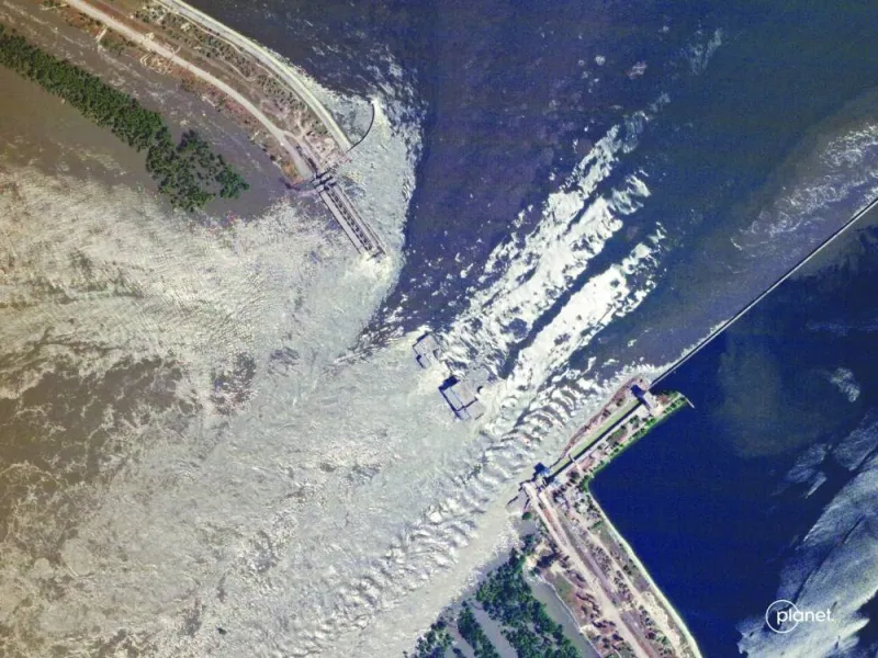 A satellite image shows the damaged Nova Kakhovka Dam in Kherson region, Ukraine on Tuesday. (Reuters)