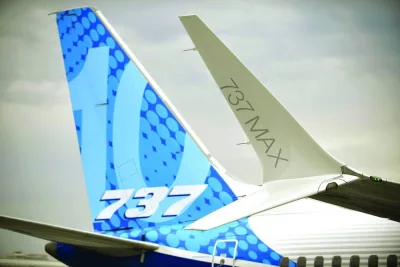 The Boeing 737 tail fin and a Boeing 737 Max winglet (right) during the International Paris Air Show at the Paris–Le Bourget Airport yesterday. In its CMO, Boeing said with a resurgence in international traffic and domestic air travel back to pre-pandemic levels, the projected global demand for 42,595 new commercial jets by 2042 is valued at $8tn.