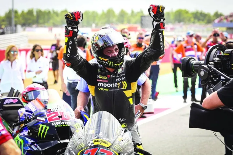 Mooney VR46 Racing’s Italian rider Marco Bezzecchi celebrates after winning the sprint race of Dutch MotoGP at the TT circuit of Assen on Saturday. (AFP)