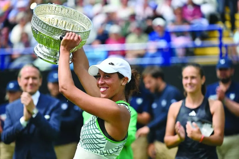 US player Madison Keys holds aloft the winner's trophy after winning against Russia's Daria Kasatkina during their women's singles final tennis match at the Rothesay Eastbourne International tennis tournament in Eastbourne, southern England, on July 1, 2023. (Photo by Glyn KIRK / AFP)
