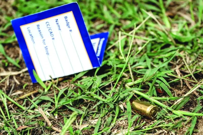 
A shell casing is seen at the site of a mass shooting in the Brooklyn Homes neighbourhood in Baltimore. 