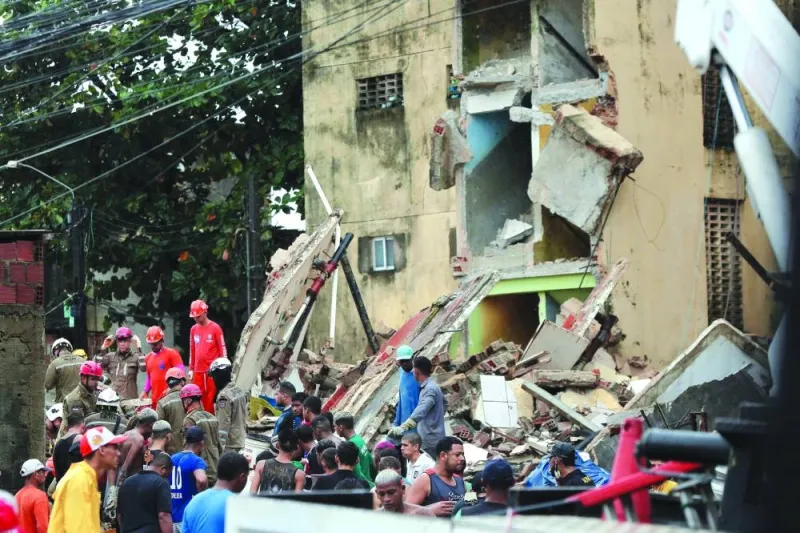 Rescue teams search for victims in the rubble of a collapsed building in the municipality of Paulista, on the outskirts of Recife, in Brazil’s northeastern state of Pernambuco.