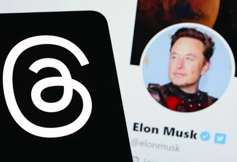 Meta Threads app logo and Elon Musk Twitter account seen in an illustration. (Reuters)