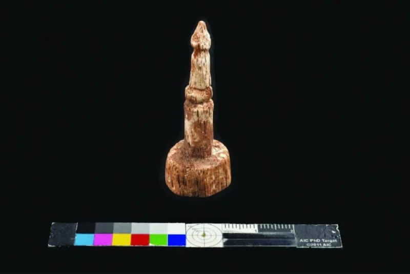 Wooden chess pieces from the archaeological site of Rubayqa in northern Qatar. PICTURES: NMoQ (screengrab)
