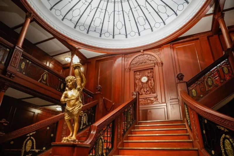 A photograph shows a replica of the Grand Staircase of the first class section of the Titanic liner on the opening day of the XXL Titanic exhibition at Paris  Expo Porte de Versailles in Paris. AFP