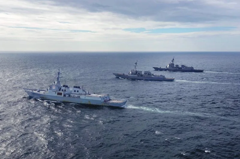 
A South Korean destroyer and a Japanese Maritime Self-Defence Force vessel sail alongside the US Navy’s Arleigh Burke-class guided-missile destroyer USS John Finn while conducting a trilateral ballistic missile defence exercise in the Sea of Japan. 