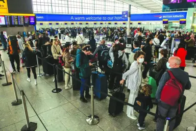 Passengers at British Airways’ check in desks at London Heathrow Airport. Majority of airlines around the world have started making profits after passengers returned to the skies, making the best use of restriction-free travel, post-pandemic.
