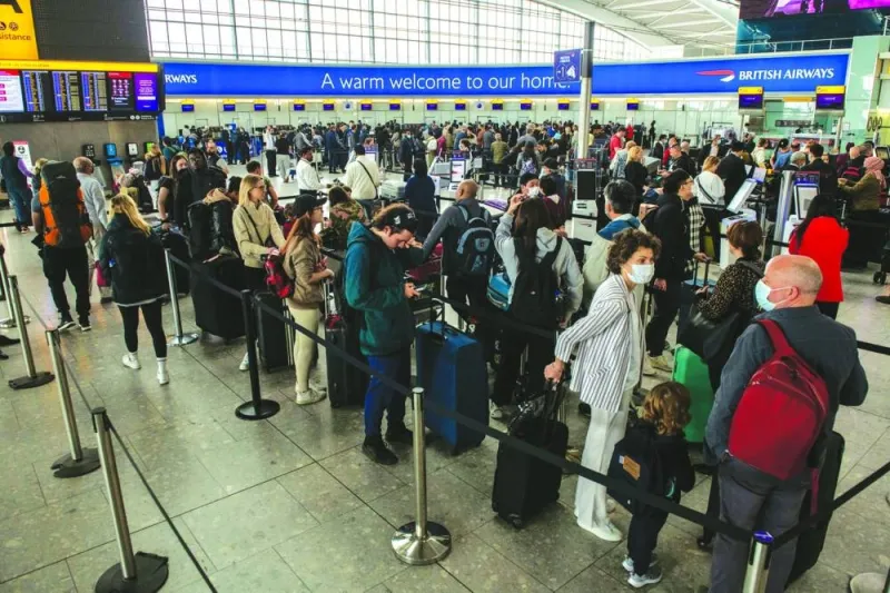 Passengers at British Airways’ check in desks at London Heathrow Airport. Majority of airlines around the world have started making profits after passengers returned to the skies, making the best use of restriction-free travel, post-pandemic.