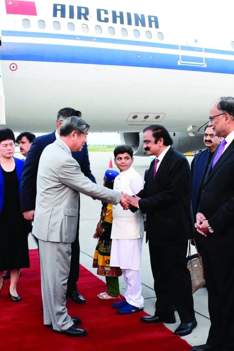 Pakistan’s Interior Minister Rana Sanaullah (third right) receiving visiting Chinese Vice-Premier He Lifeng upon his arrival in Islamabad. (AFP)