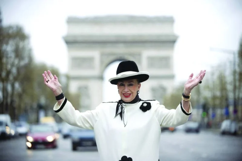 
President of the Miss France Comity, Genevieve de Fontenay, poses on the Champs-Elysees avenue, in Paris, on April 7, 2009. (AFP) 