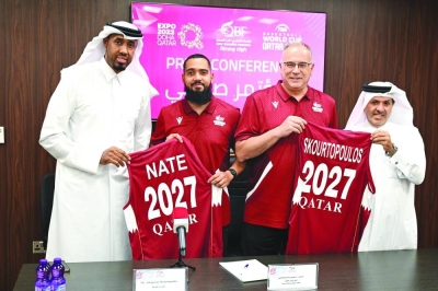 Newly-appointed Qatar basketball team head coach Athanasios Skourtopoulos (second from right) and fitness coach Nataniel David Lucas (second from left) pose with QBF secretary-general Saadoun Sabah al-Kuwari (right) and director of the team Yaseen Ismail Musa at QBF headquarters in Al Gharrafa on Tuesday.