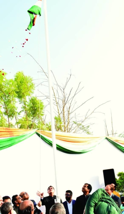Ambassador Vipul hoisting the Indian tricolour. PICTURE: Thajudheen