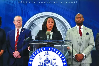 Fulton County District Attorney Fani Willis speaks during a news conference at the Fulton County Government building.  