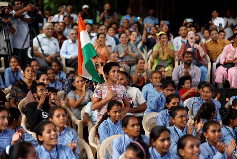 People react as they watch a live stream of Chandrayaan-3 spacecraft&#039;s landing on the moon, at an auditorium of Gujarat Science City in Ahmedabad, India, 2023. REUTERS