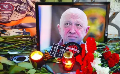 
A view shows a portrait of Wagner mercenary chief Yevgeny Prigozhin at a makeshift memorial in Moscow on Thursday. (Reuters) 