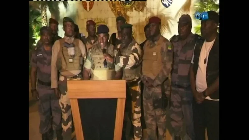 Gabonese military appear on television as they announce that they have seized power following President Ali Bongo Ondimba&#039;s re-election, in this screengrab obtained by Reuters. Gabon 1ere/Handout via REUTERS  