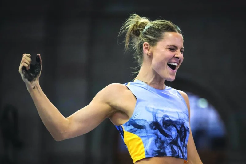 Australia’s Nina Kennedy celebrates after winning the pole vault event at the Zurich Diamond League meeting on Wednesday. (AFP)
