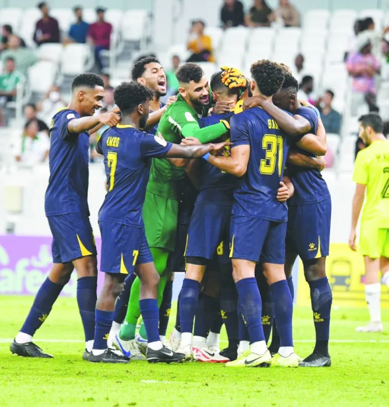 Al Gharafa players celebrate their 4-1 win over Al Ahli in the Expo Stars League clash at the Al Thumama Stadium on Friday. In two other matches on Friday, Muaither beat Al Markhiya 5-2 while Qatar SC and Umm Salal played a 2-2 draw.