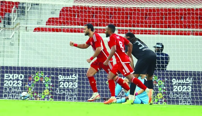 Al Arabi’s Omar al-Somah (left) celebrates after scoring a last-gasp equaliser against Al Duhail at the Al Thumama Stadium on Saturday.