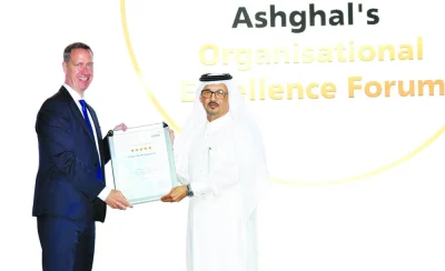 Engineer Jamal Sharida al-Kaabi receiving the certificate of excellence from Russell Longmuir. PICTURES: Thajudheen.