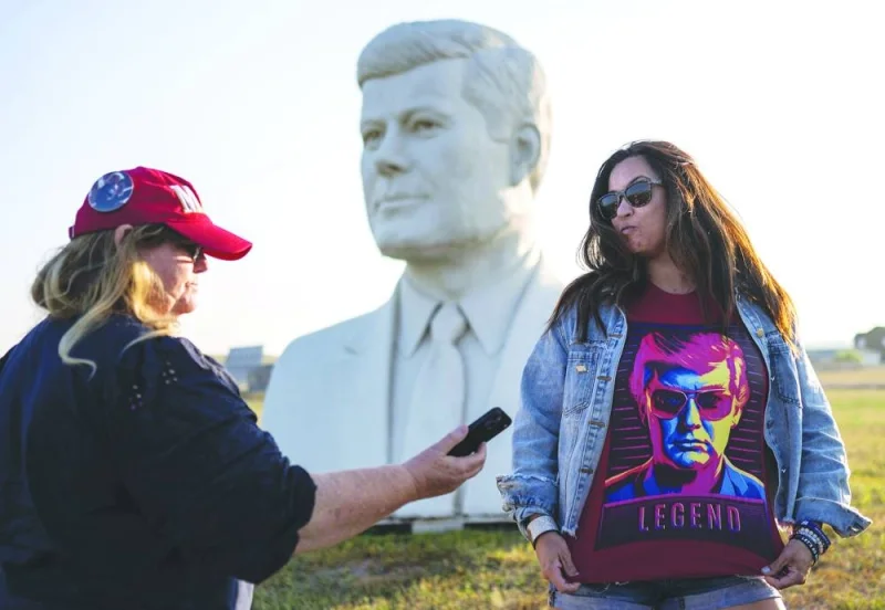 
Ileane and Kristi (right), from California, take photos with a bust of former US president John F Kennedy near Rapid City, South Dakota, after arriving in town to attend Donald Trump’s speech at the South Dakota Republican Party’s Monumental Leaders rally. 