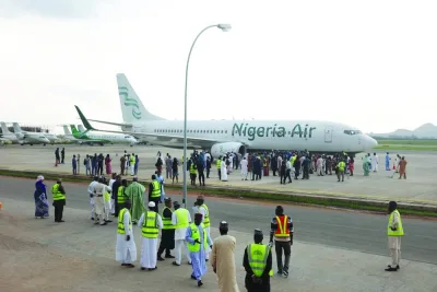 People near the Nigeria National Air flight at the Nnamdi Azikwe International Airport in Abuja (file). Infrastructure constraints, high costs, lack of connectivity, regulatory impediments, slow adoption of global standards and skills shortages affect the customer experience and are all contributory factors to African airlines’ viability and sustainability.