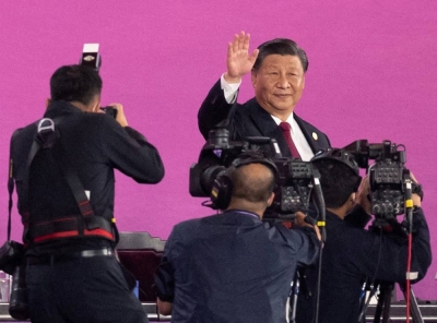  President of China Xi Jinping waves during the opening ceremony of the Asian Games Hangzhou 2022 at Hangzhou Olympic Sports Center Stadium, Hangzhou, China. REUTERS