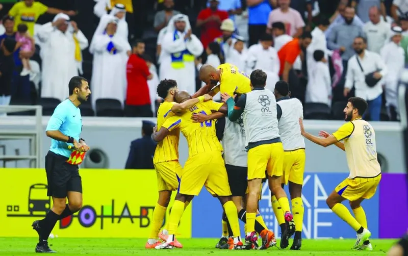 
Al Gharafa players celebrate their win over Al Duhail in Round 4 of the Expo Stars League at Al Bayt Stadium yesterday. 