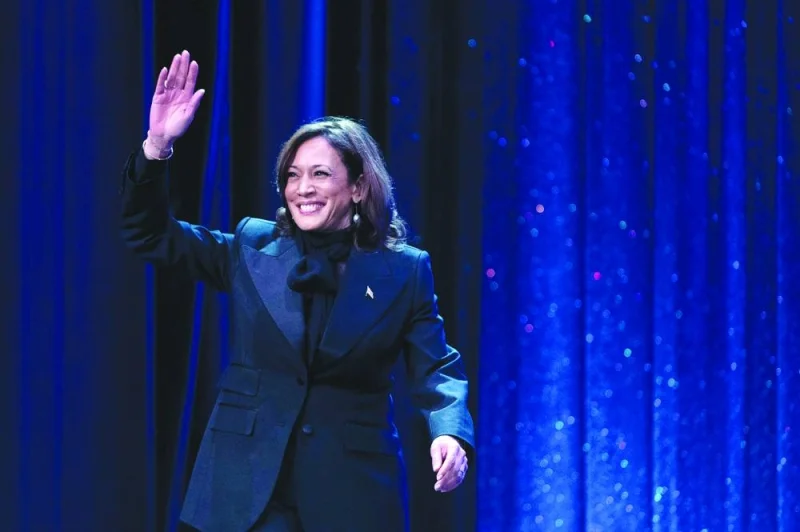 
US Vice-President Kamala Harris waves as she walks onstage to speak during the Congressional Black Caucus Foundation 2023 Phoenix awards dinner at the Washington Convention Center in Washington, DC. (AFP) 
