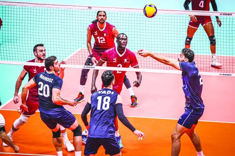 Qatar and Iran volleyball players in action during the semi-final match at the Linping Sports Centre in Hangzhou on Monday.