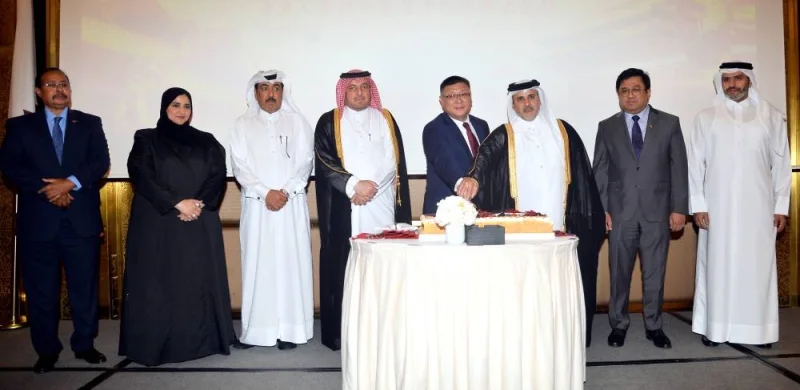 Chinese chargé d&#039;affaires Chen Yue is joined by Qatar&#039;s Minister of Municipality HE Dr Abdullah bin Abdulaziz bin Turki al-Subaie and other dignitaries Wednesday at the celebrations. PICTURES: Shaji Kayamkulam.