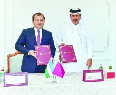 Qatar Chamber first vice-chairman Mohamed bin Towar al-Kuwari and Uzbekistan Chamber chairman Davron Vakhabov during the signing ceremony.
