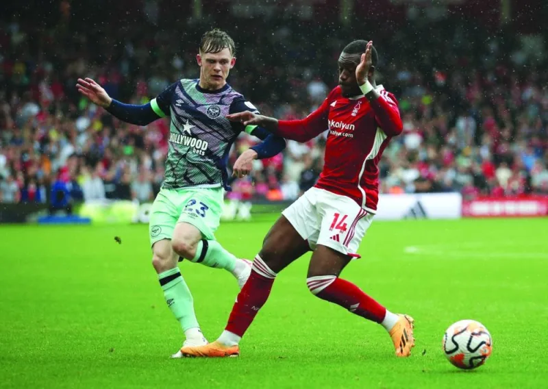 Nottingham Forest’s Callum Hudson-Odoi in action with Brentford’s Keane Lewis-Potter at the The City Ground, Nottingham, Britain, on Sunday. (Reuters)