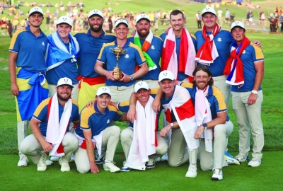 Team Europe captain Luke Donald poses with the trophy and his team as they celebrate after winning the Ryder Cup at Marco Simone Golf & Country Club, Rome, Italy, on Sunday. (Reuters)