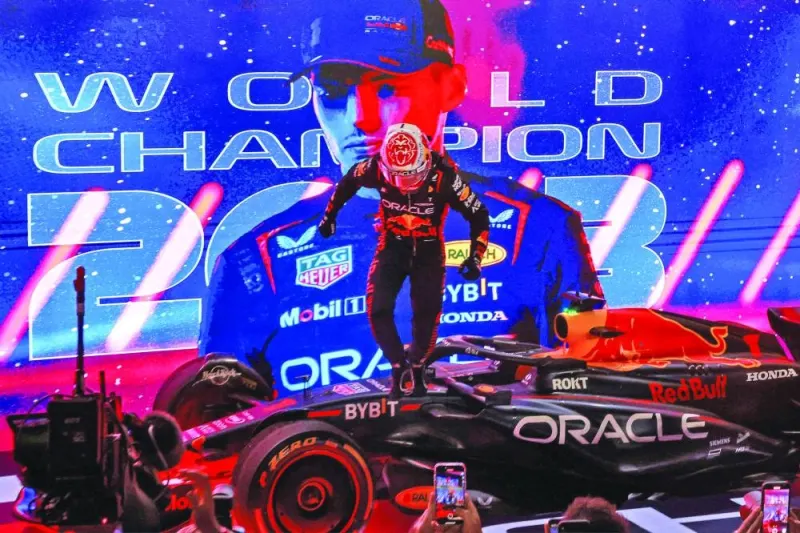 Red Bull Racing’s Dutch driver Max Verstappen celebrates winning his third world title on Saturday. (AFP)