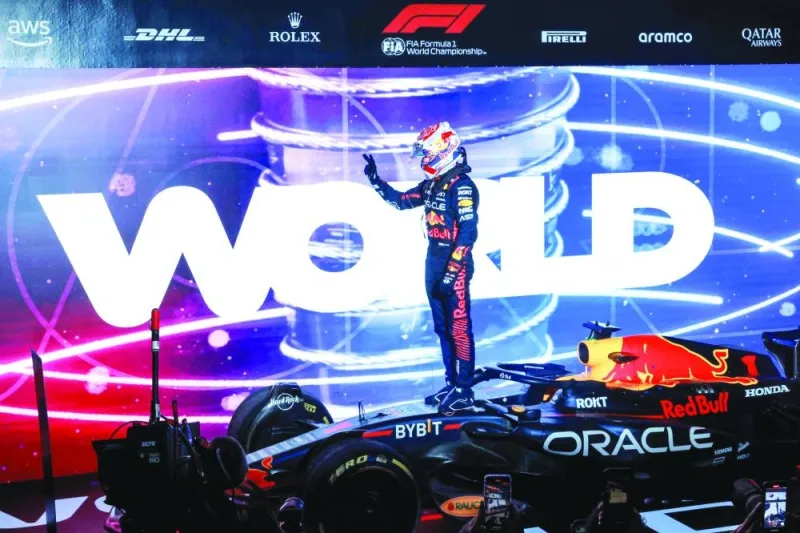 Red Bull Racing&#039;s Dutch driver Max Verstappen celebrates winning his third world title after the sprint race ahead of the Qatari Formula One Grand Prix at the Lusail International Circuit on Saturday. (AFP)