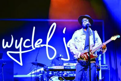 Grammy-winning artist Wyclef Jean performing at the event.