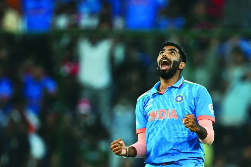Jasprit Bumrah of India celebrates after taking the wicket of Afghanistan’s Mohamed Nabi in New Delhi on Wednesday. (AFP)