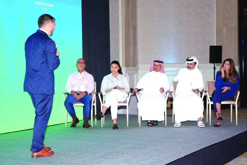 A participant of the &#039;Pitch Pit&#039; segment delivers a presentation before a panel of investors, including Sheikh Mansoor bin Khalifa al-Thani (MBK Holding), Sara Daniel (Doha Tech Angels), Misfer al-Hajri (Ajyal), Zainab al-Sharif (Plus VC), and Marcel Dridje (eban).