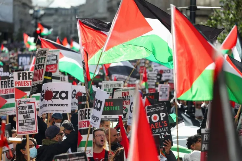 Demonstrators protest in solidarity with Palestinians, in London, Saturday. REUTERS