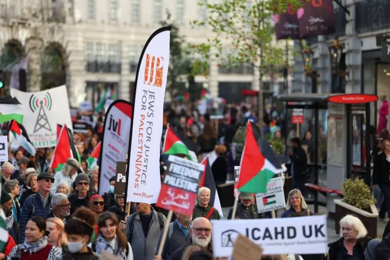 Demonstrators protest in solidarity with Palestinians, in London, Saturday. REUTERS