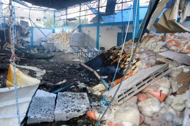 A picture shows a damaged UNRWA food aid warehouse and distribution center due to Israeli strikes in Tall al-Hawa neighbourhood in southern Gaza City on Monday.  AFP